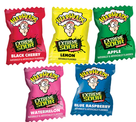 Warheads Extreme Sour Hard Candy individual wrappers in five flavors Black Cherry, Lemon, Apple, Watermelon, and Blue Raspberry.
