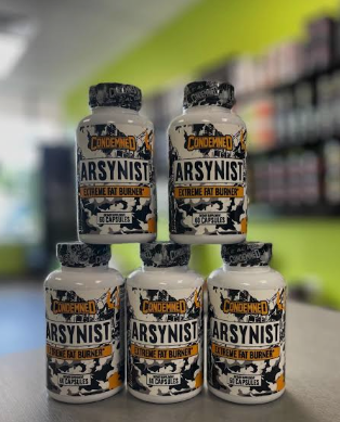 A stack of Condemned Labz Arsynist Extreme Fat Burner bottles on a counter for an Arsynist Fat Burner Review
